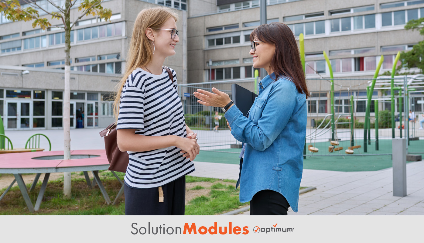 student teacher meeting on campus