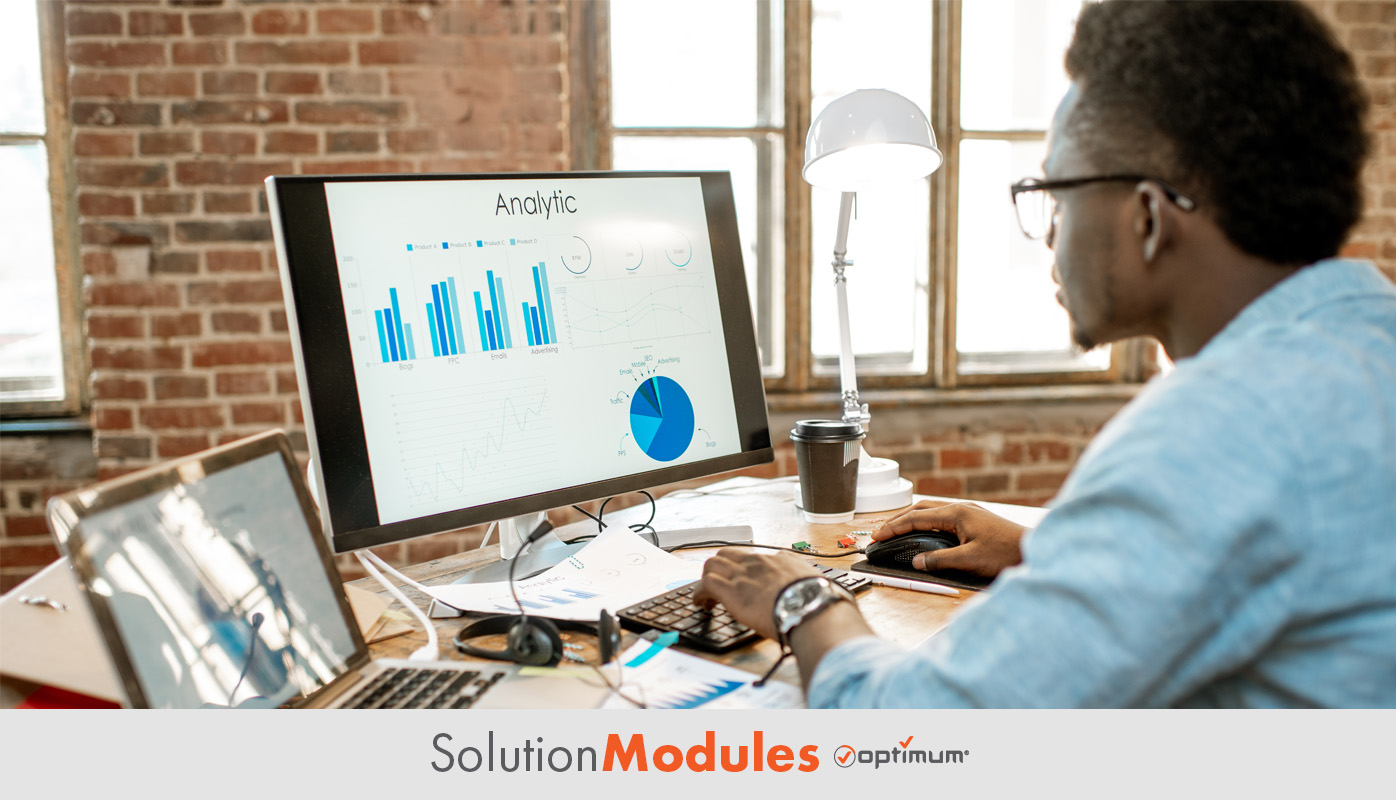 man using analytics on laptop